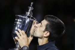 雷速体育网页版-美网碾压温网，鲁德高光表现